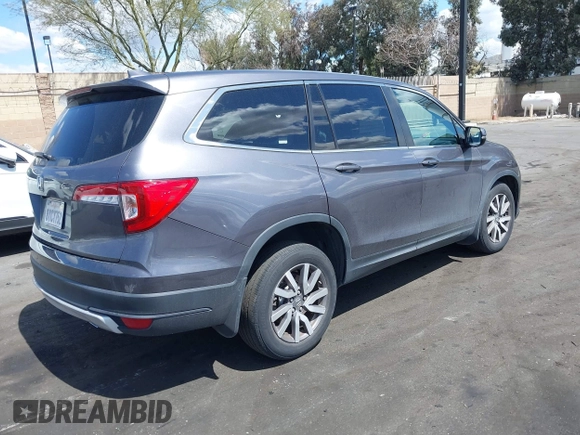 2021 Honda Pilot EX-L with VIN 5FNYF5H57MB046740, listed as a IAAI auction lot 41943366 with 31,198 mi miles and . Bid and sale history available at DreamBid. Image 4.