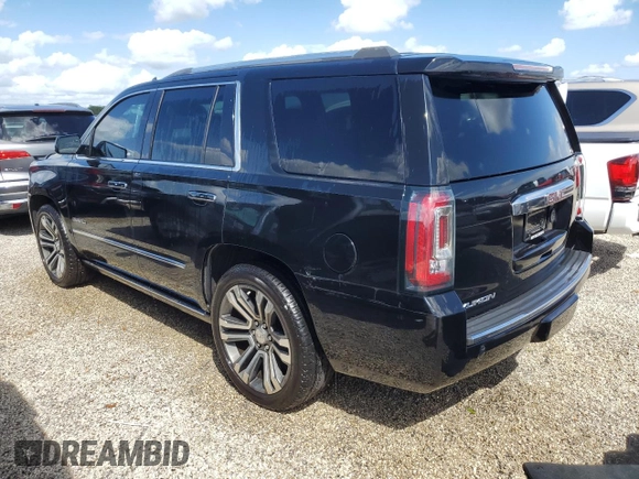2020 GMC Yukon Denali with VIN 1GKS1CKJXLR181612, listed as a Copart auction lot 74451364 with 52,761 mi miles and Salvage Title. Bid and sale history available at carsss.com. Image 2.