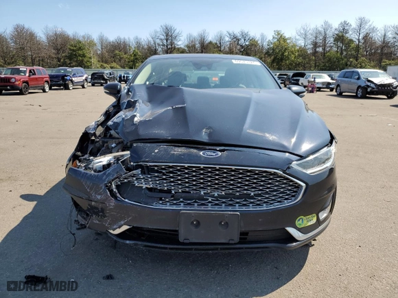 2020 Ford Fusion Plug-In Hybrid Titanium with VIN 3FA6P0SUXLR101997, listed as a Copart auction lot 69575324 with 74,121 mi miles and Salvage Title. Bid and sale history available at carsss.com. Image 5.