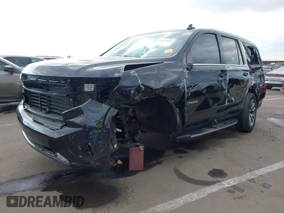 2023 Chevrolet Tahoe LT z VIN 1GNSCNKD5PR510046, wystawiony jako IAAI lot #42213868 z przebiegiem 35 761 mil mil oraz . Historia ofert i sprzedaży dostępna na DreamBid. Obrazek 6.