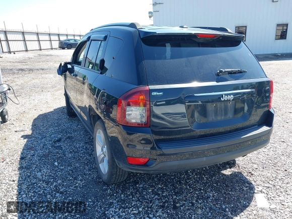 2014 Jeep Compass Sport with VIN 1C4NJCBA0ED510942, listed as a IAAI auction lot 41952596 with 196,030 mi miles and . Bid and sale history available at DreamBid. Image 3.