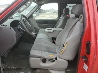 2003 Ford F-150 XL with VIN 1FTRX07W43KD70938, listed as a Copart auction lot 85127034 with 0 mi miles and Salvage Title. Bid and sale history available at carsss.com. Image 7.