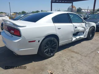 2014 Dodge Charger RT z VIN 2C3CDXCT1EH309189, wystawiony jako IAAI lot #42158197 z przebiegiem 92 074 mil mil oraz . Historia ofert i sprzedaży dostępna na DreamBid. Obrazek 4.