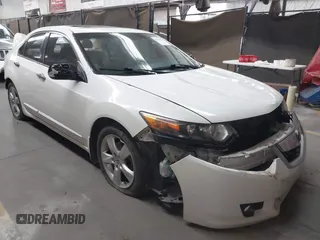 2009 Acura TSX with VIN JH4CU26669C028582, listed as a IAAI auction lot 42074708 with 194,316 mi miles. Bid and sale history available at carsss.com. Image 1.