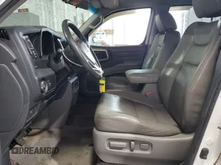 2010 Honda Ridgeline RTL z VIN 5FPYK1F53AB006195, wystawiony jako Copart lot #52528435 z przebiegiem 205 522 mil mil oraz Szkoda całkowita • Salvage title. Historia ofert i sprzedaży dostępna na DreamBid. Obrazek 7.