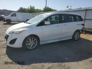 2012 Mazda 5 Touring z VIN JM1CW2CL6C0106745, wystawiony jako Copart lot #59222675 z przebiegiem 184 918 mil mil oraz Szkoda całkowita • Salvage title. Historia ofert i sprzedaży dostępna na DreamBid. Obrazek 1.