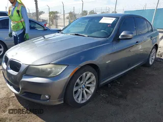 2011 BMW 3 Series 328i with VIN WBAPH5G55BNM71702, listed as a IAAI auction lot 42013598 with 192,744 mi miles. Bid and sale history available at carsss.com. Image 2.