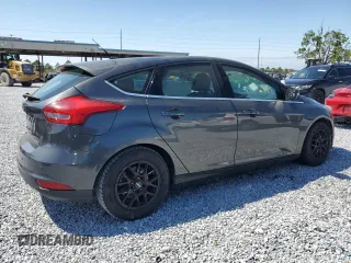 2015 Ford Focus Titanium with VIN 1FADP3N24FL260486, listed as a Copart auction lot 49856865 with Not provided miles and Clean title. Bid and sale history available at DreamBid. Image 3.