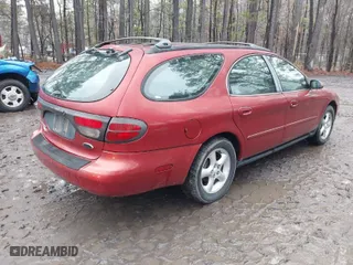 2001 Ford Taurus SE Standard with VIN 1FAFP58U91A290623, listed as a IAAI auction lot 41503243 with 117,194 mi miles. Bid and sale history available at carsss.com. Image 4.