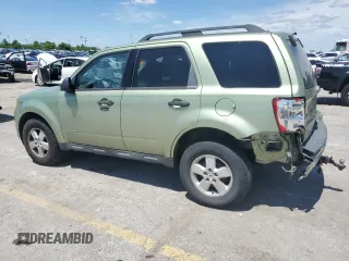 2008 Ford Escape XLT with VIN 1FMCU03158KC24575, listed as a Copart auction lot 57133855 with 200,329 mi miles and Salvage title. Bid and sale history available at DreamBid. Image 2.