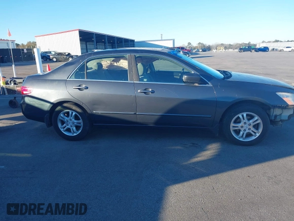 2005 Honda Accord EX with VIN 1HGCM56715A022210, listed as a IAAI auction lot 41165319 with 232,830 mi miles and . Bid and sale history available at DreamBid. Image 14.