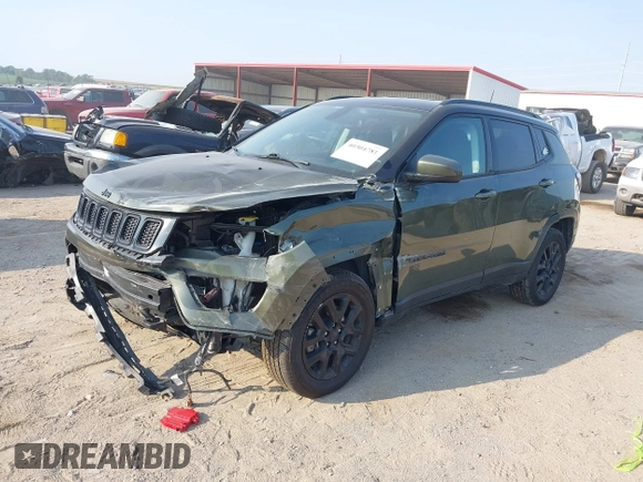 2021 Jeep Compass Sport with VIN 3C4NJDAB2MT591225, listed as a IAAI auction lot 40304781 with 63,948 mi miles and . Bid and sale history available at DreamBid. Image 2.
