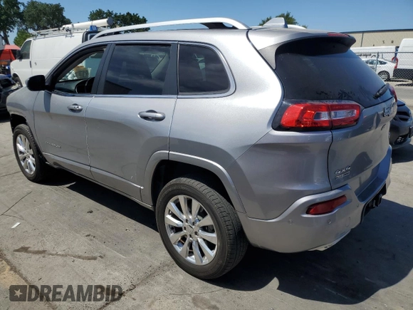 2017 Jeep Cherokee Overland z VIN 1C4PJMJS1HW588812, wystawiony jako Copart lot #58182885 z przebiegiem 77 794 mil mil oraz Szkoda całkowita • Salvage title. Historia ofert i sprzedaży dostępna na DreamBid. Obrazek 2.