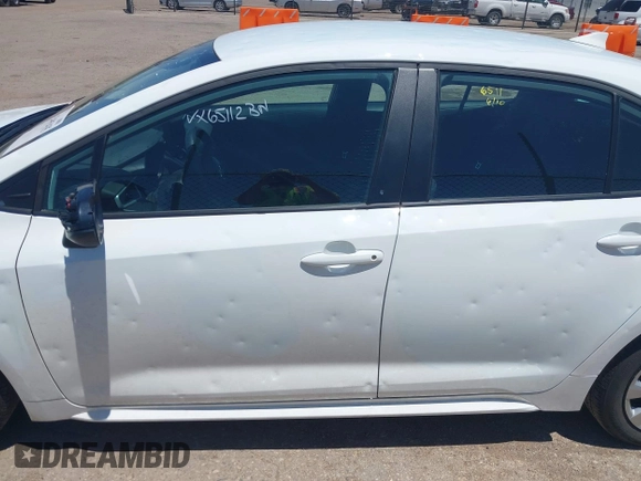 2025 Toyota Corolla LE z VIN 5YFB4MDE0SP287827, wystawiony jako IAAI lot #42495435 z przebiegiem 7 062 mil mil oraz . Historia ofert i sprzedaży dostępna na DreamBid. Obrazek 14.