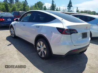 2022 Tesla Model Y Long Range z VIN 7SAYGDEE9NF509655, wystawiony jako IAAI lot #42433796 z przebiegiem 46 936 mil mil oraz . Historia ofert i sprzedaży dostępna na DreamBid. Obrazek 3.