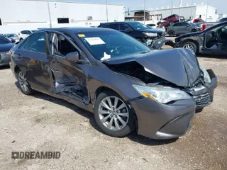 2015 Toyota Camry XLE with VIN 4T1BF1FK0FU952421, listed as a IAAI auction lot 41714622 with 125,553 mi miles and . Bid and sale history available at DreamBid. Image 1.