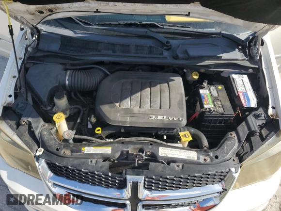 2011 Dodge Grand Caravan Crew with VIN 2D4RN5DG5BR755153, listed as a Copart auction lot 54404625 with 140,307 mi miles and Salvage Title. Bid and sale history available at DreamBid. Image 12.
