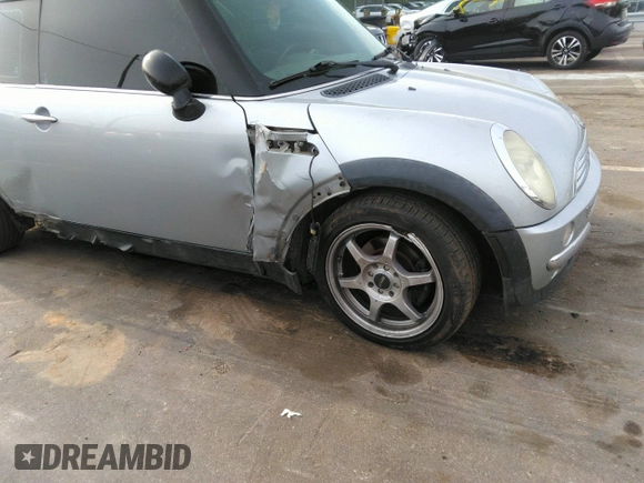 2002 MINI Hardtop with VIN WMWRC33432TE10226, listed as a IAAI auction lot 41973956 with 156,445 mi miles and . Bid and sale history available at DreamBid. Image 6.