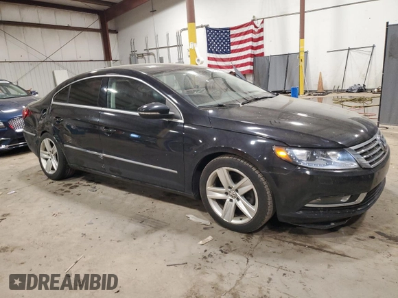 2014 Volkswagen CC Sport with VIN WVWBP7AN4EE537603, listed as a Copart auction lot 65530194 with 173,835 mi miles and Salvage Title. Bid and sale history available at carsss.com. Image 4.