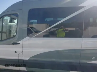 2017 Ford Transit Passenger XL with VIN 1FBZX2CM7HKB08794, listed as a IAAI auction lot 42312072 with 42,676 mi miles and . Bid and sale history available at DreamBid. Image 14.