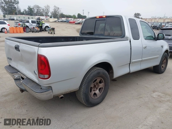 2000 Ford F-150 XL with VIN 1FTRX17W0YKA70861, listed as a IAAI auction lot 42096438 with 1 mi miles. Bid and sale history available at carsss.com. Image 4.