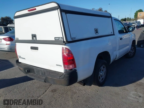 2014 Toyota Tacoma with VIN 5TFNX4CN6EX032823, listed as a IAAI auction lot 41711243 with 141,201 mi miles and . Bid and sale history available at DreamBid. Image 4.