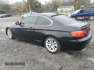 2012 BMW 3 Series 328i with VIN WBAKE5C59CJ106098, listed as a Copart auction lot 51977925 with 136,275 mi miles and Salvage title. Bid and sale history available at DreamBid. Image 2.
