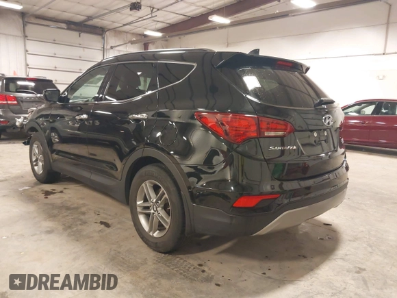 2017 Hyundai Santa Fe 2.4L with VIN 5NMZUDLBXHH041621, listed as a IAAI auction lot 42194586 with 91,012 mi miles and . Bid and sale history available at DreamBid. Image 3.