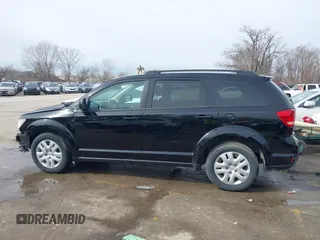2019 Dodge Journey SE with VIN 3C4PDCBB8KT844800, listed as a IAAI auction lot 41721062 with 148,390 mi miles and . Bid and sale history available at DreamBid. Image 15.