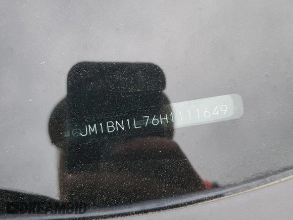2017 Mazda 3 Touring z VIN JM1BN1L76H1111649, wystawiony jako Copart lot #51713185 z przebiegiem 104 749 mil mil oraz Szkoda całkowita • Salvage title. Historia ofert i sprzedaży dostępna na DreamBid. Obrazek 12.