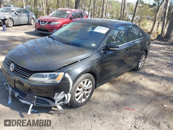 2013 Volkswagen Jetta SE with VIN 3VWDX7AJ5DM375119, listed as a IAAI auction lot 41779752 with 149,943 mi miles and . Bid and sale history available at DreamBid. Image 2.