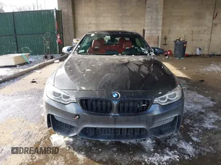 2017 BMW M4 with VIN WBS3U9C55HP970922, listed as a IAAI auction lot 41405271 with 61,953 mi miles. Bid and sale history available at carsss.com. Image 12.
