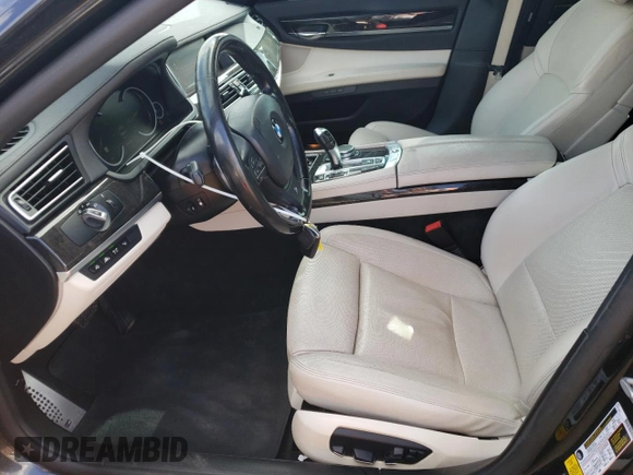 2015 BMW 7 Series 740Li with VIN WBAYE4C55FD947147, listed as a Copart auction lot 43274705 with 194,914 mi miles and Salvage Title. Bid and sale history available at DreamBid. Image 7.