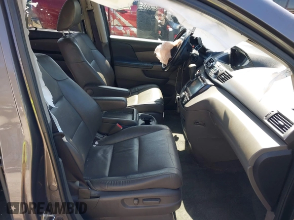 2016 Honda Odyssey EX-L with VIN 5FNRL5H66GB019426, listed as a IAAI auction lot 41939019 with 156,226 mi miles and . Bid and sale history available at DreamBid. Image 5.