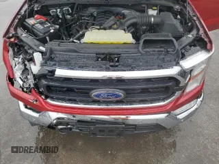 2021 Ford F-150 XL with VIN 1FTMF1E56MKE11052, listed as a Copart auction lot 46273985 with 31,100 mi miles and Salvage title. Bid and sale history available at DreamBid. Image 11.