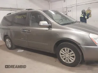 2011 Kia Sedona LX with VIN KNDMG4C78B6363742, listed as a IAAI auction lot 42063426 with 199,828 mi miles. Bid and sale history available at carsss.com. Image 6.
