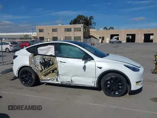 2022 Tesla Model Y Long Range with VIN 7SAYGDEE0NF340822, listed as a IAAI auction lot 41881224 with Not Provided miles and . Bid and sale history available at DreamBid. Image 14.