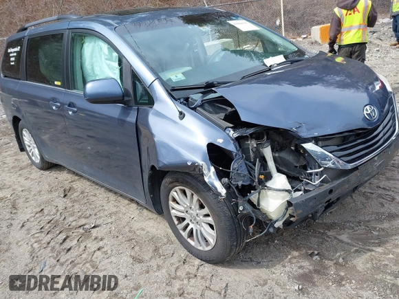 2014 Toyota Sienna XLE with VIN 5TDYK3DC9ES511035, listed as a IAAI auction lot 41884115 with 153,071 mi miles. Bid and sale history available at carsss.com. Image 1.