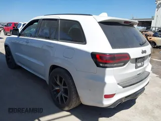 2017 Jeep Grand Cherokee SRT with VIN 1C4RJFDJ0HC699537, listed as a IAAI auction lot 41781500 with 105,640 mi miles. Bid and sale history available at carsss.com. Image 3.