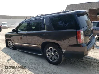 2016 GMC Yukon SLT with VIN 1GKS2BKC4GR104863, listed as a Copart auction lot 70062604 with 118,377 mi miles and Salvage Title. Bid and sale history available at carsss.com. Image 2.