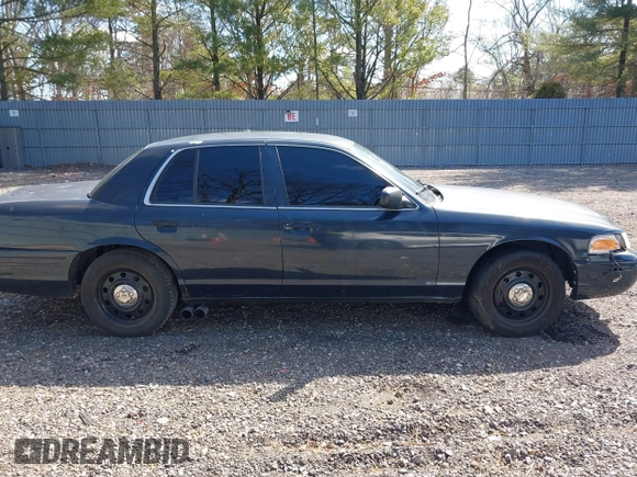 2006 Ford Police Interceptor z VIN 2FAHP71W86X156281, wystawiony jako IAAI lot #41751681 z przebiegiem 125 664 mil mil oraz . Historia ofert i sprzedaży dostępna na DreamBid. Obrazek 13.