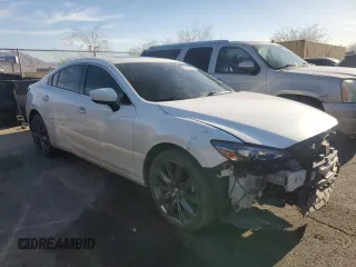 2021 Mazda 6 Touring with VIN JM1GL1VM6M1612064, listed as a Copart auction lot 50189355 with 69,319 mi miles and Salvage Title. Bid and sale history available at DreamBid. Image 4.