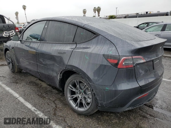 2025 Tesla Model Y Long Range with VIN 7SAYGAEE3SF216635, listed as a Copart auction lot 44614555 with 400 mi miles and Salvage Title. Bid and sale history available at DreamBid. Image 2.