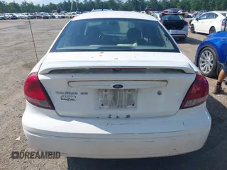 2007 Ford Taurus SE with VIN 1FAFP53U57A187358, listed as a IAAI auction lot 42583317 with Not provided miles and . Bid and sale history available at DreamBid. Image 14.