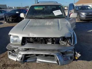 2000 Toyota 4Runner Limited with VIN JT3HN87R6Y0283866, listed as a IAAI auction lot 41639423 with 285,426 mi miles. Bid and sale history available at carsss.com. Image 6.
