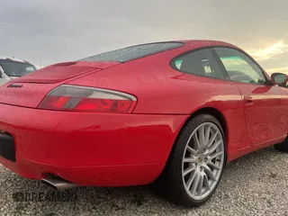 1999 Porsche 911 z VIN WP0AA2991XS620689, wystawiony jako Copart lot #59999925 z przebiegiem 152 508 mil mil oraz Czysty tytuł • Clean title. Historia ofert i sprzedaży dostępna na DreamBid. Obrazek 4.
