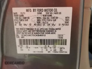 2012 Ford Escape XLS z VIN 1FMCU9C75CKB46512, wystawiony jako Copart lot #50629455 z przebiegiem Nie podano mil oraz Nie do naprawy • Non repairable. Historia ofert i sprzedaży dostępna na DreamBid. Obrazek 14.