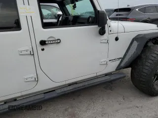2018 Jeep Wrangler JK Unlimited Sport S with VIN 1C4BJWDG2JL809600, listed as a Copart auction lot 76384474 with 0 mi miles and Non Repairable. Bid and sale history available at carsss.com. Image 13.