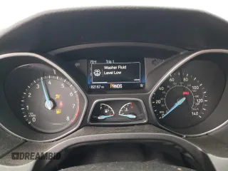 2016 Ford Focus SE z VIN 1FADP3F23GL405565, wystawiony jako Copart lot #60173935 z przebiegiem 82 167 mil mil oraz Szkoda całkowita • Salvage title. Historia ofert i sprzedaży dostępna na DreamBid. Obrazek 9.