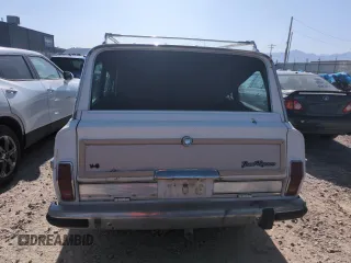 1987 Jeep Grand Wagoneer с VIN 1JCNJ15UXHT013691, выставлен на аукционе Copart как лот 59439595 с пробегом 174 941 миль миль и Чистый • Clean title. История ставок и продаж доступна на DreamBid. Изображение 6.